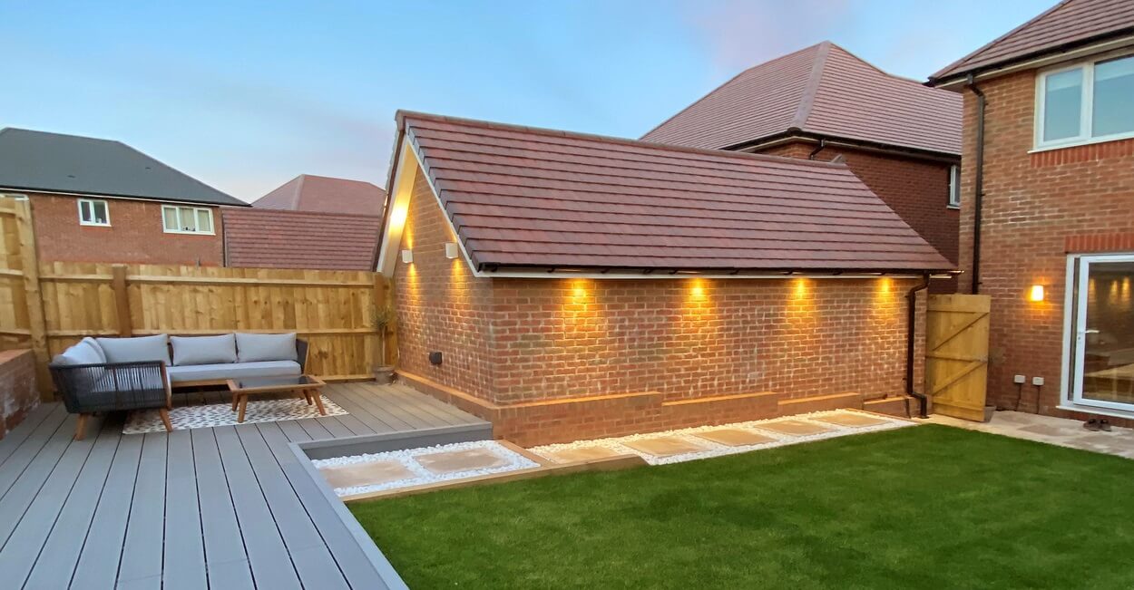 A garden project featuring Cladco Composite Decking Boards with matching Corner Trims in Light Grey