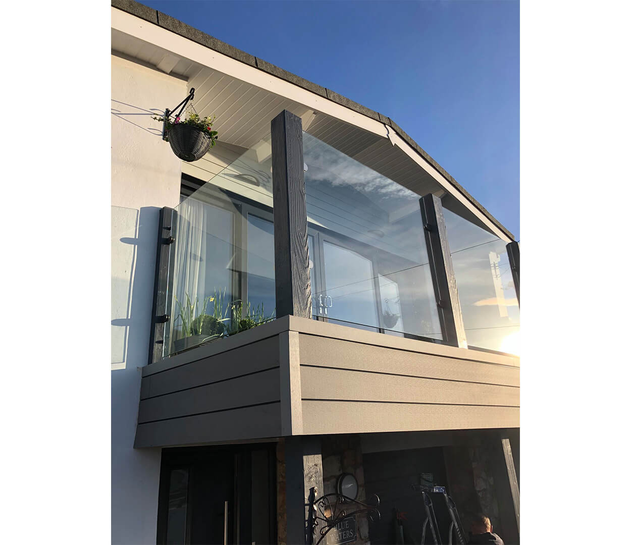 Stone Grey Wall Cladding Balcony with glass balustrade 