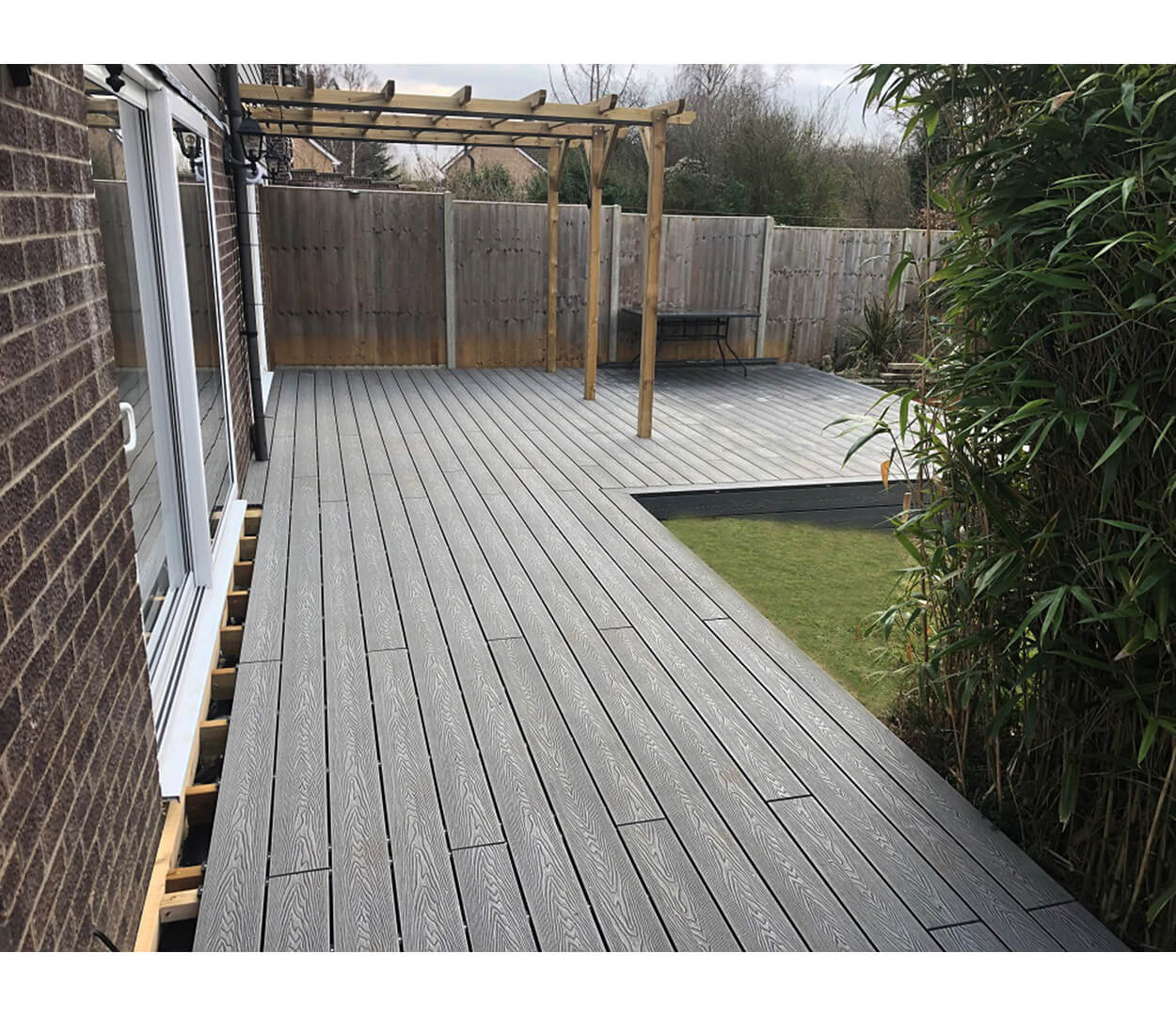 Cladco Stone Grey Woodgrain boards with a veranda