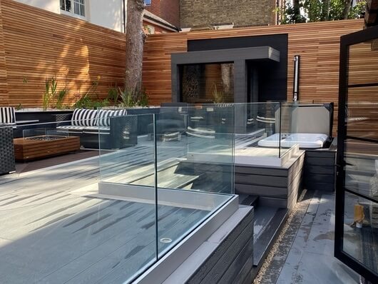 Garden deck with glass balustrades