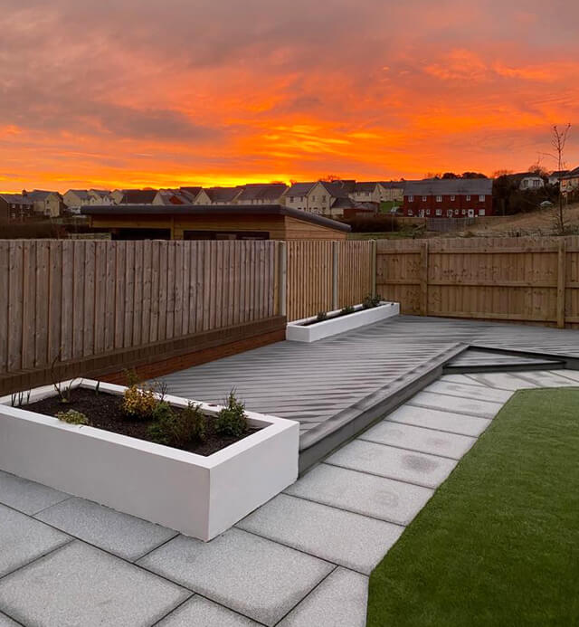 Decking combined with stone pavings