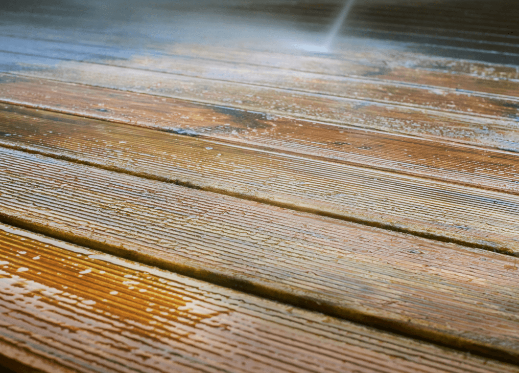 Decking being pressure washed