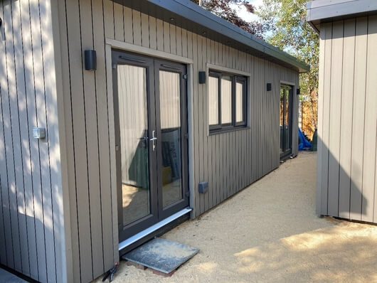 Garden room with Stone Grey Wall Cladding