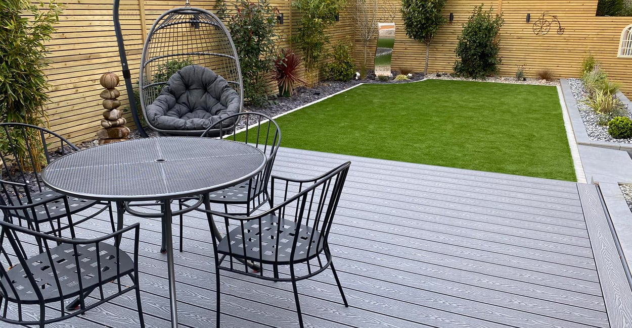 grey decking with metallic furniture