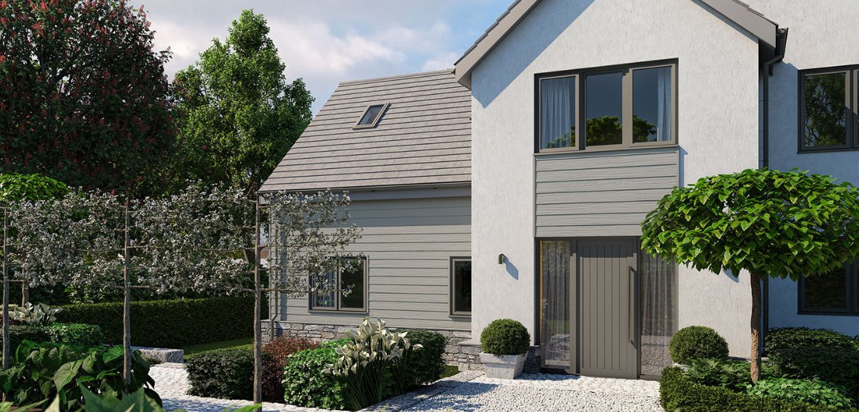 This large detached home has used our Fibre Cement Wall Cladding Boards in Sage Green to add a neutral palette to their home’s fascia, working beautifully with the shrubs and greenery of the front garden. Light Grey Fibre Cement Cladding completes a small outbuilding perfectly