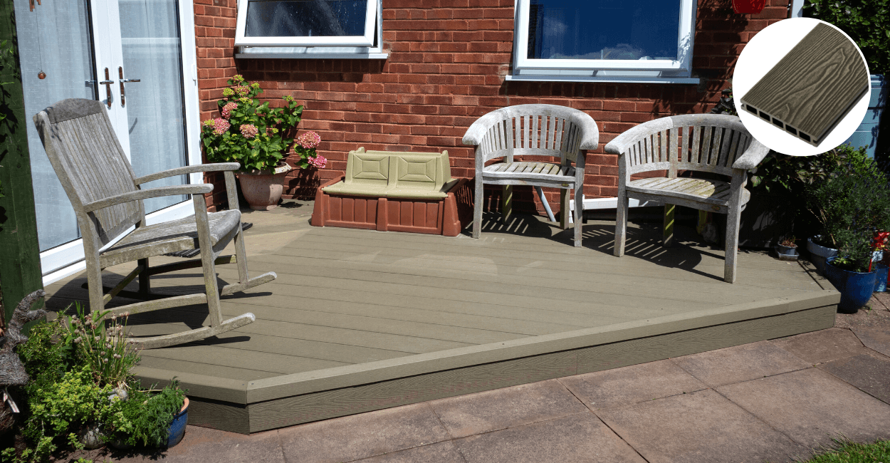 Woodgrain Composite Decking in the colour Olive Green by Cladco corner of a garden with olive green decking