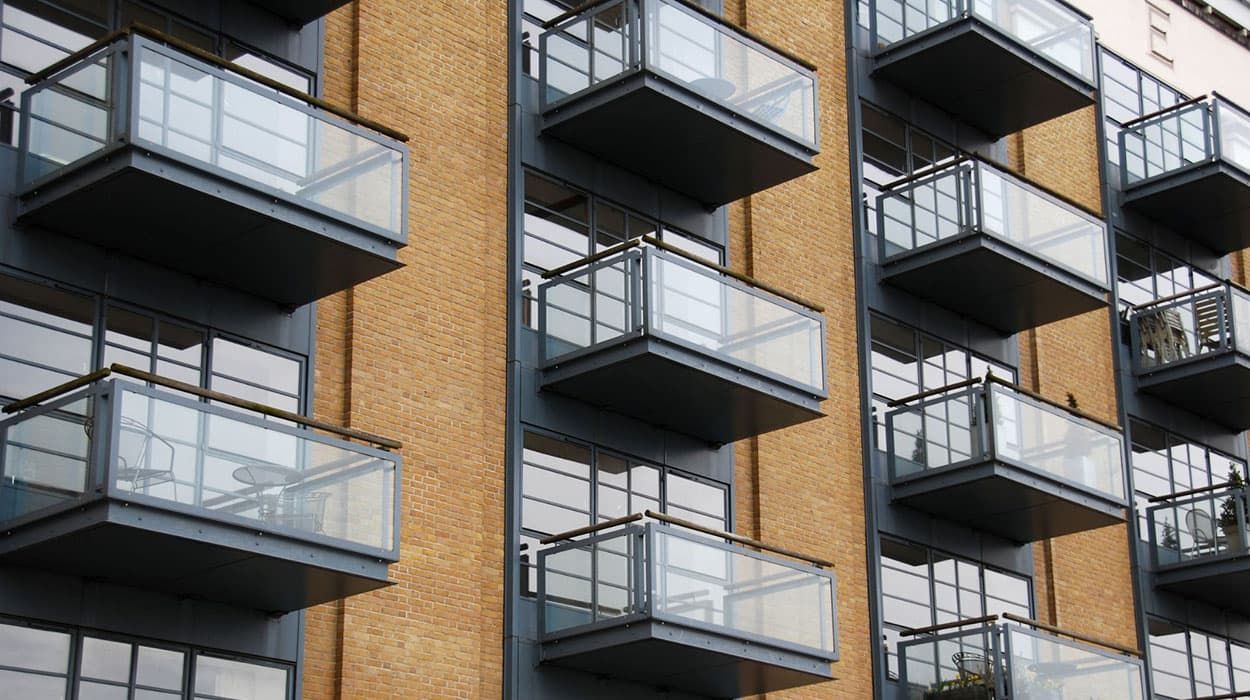 Multi-storey balconies require extra safety measurements when it comes to installing decking