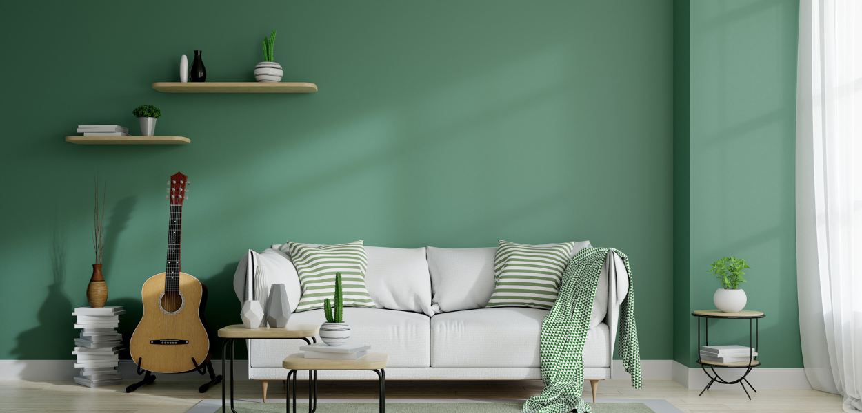 Living room feature wall: Complement green decorative items in your home with a matching accent wall