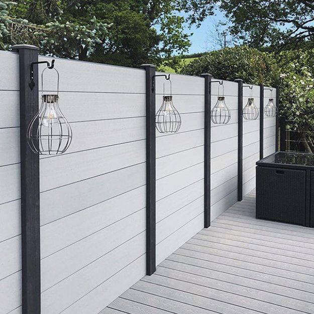 light grey composite fencing with contrasting charcoal fence posts