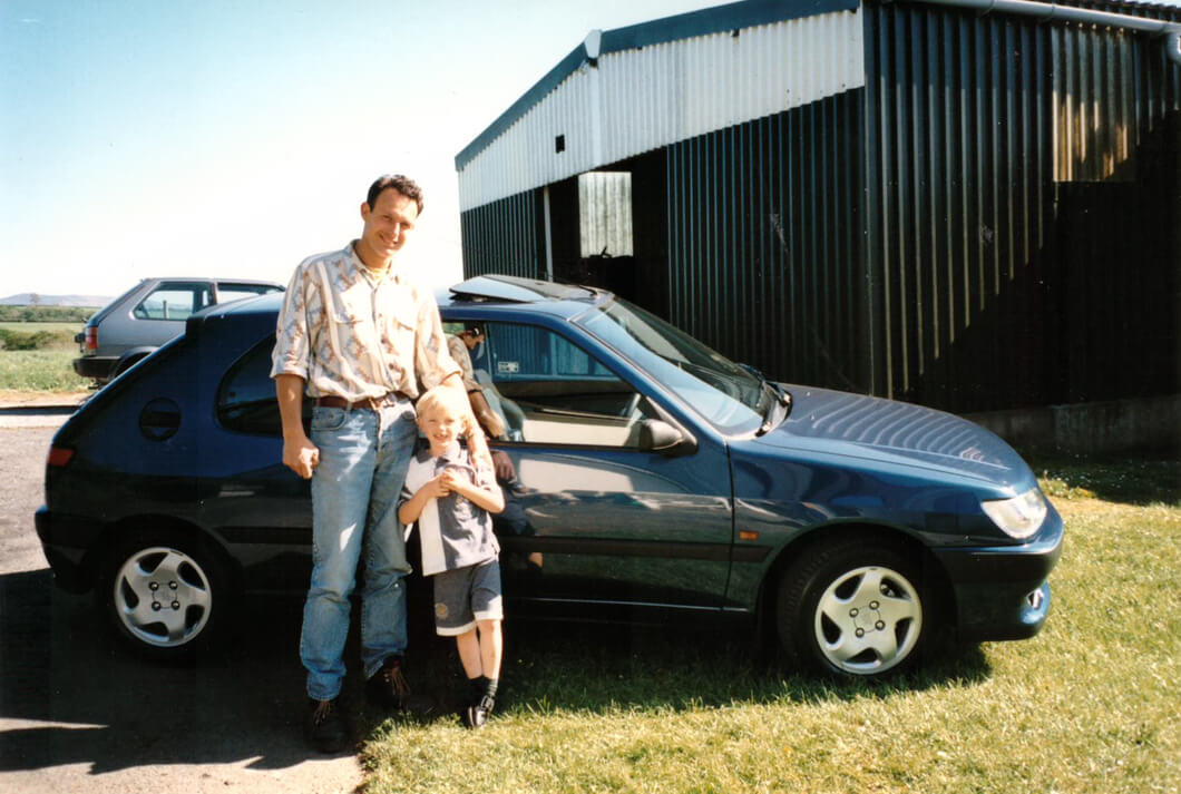 Lawrence and his son, Dan, outside the original warehouse