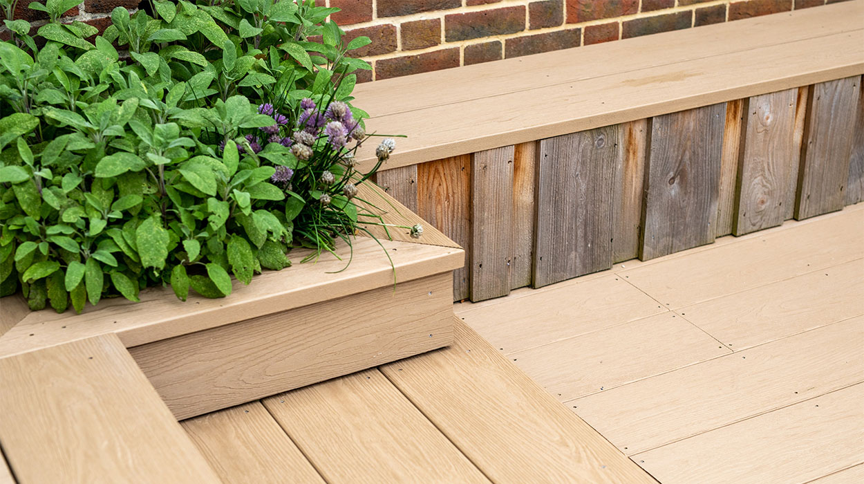 Plant bed, steps and seating area have been created using Cladco PVC Decking Boards in Cedar Wood colour. Woodgrain Effect PVC Decking provides scratch and water resistance.