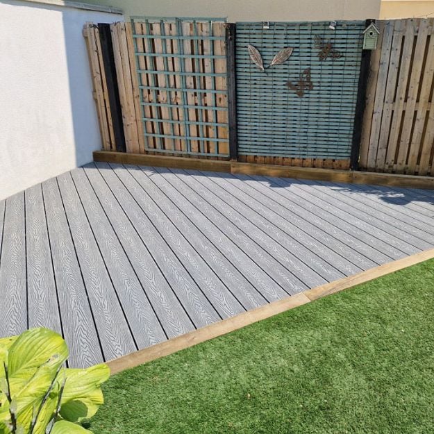 Stone Grey decking by Cladco installed on a patio area