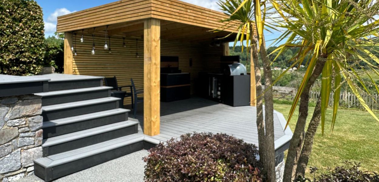 Multi-level small garden with grey decking