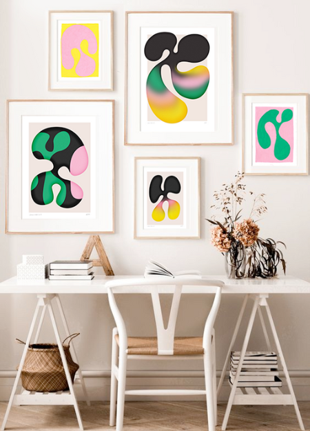 Gallery walls are a great way to breathe life into a small work space