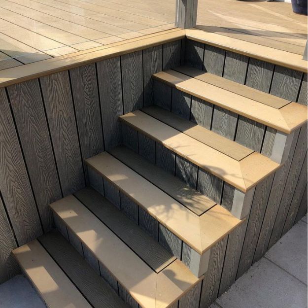 After: Deck stairs in contrasting colours Olive Green (base) and Teak (steps) for a unique deck design