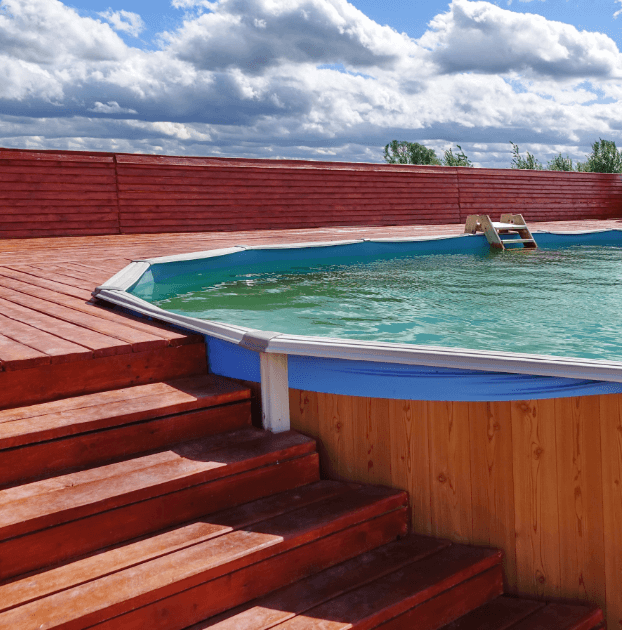 Timber decking surrounding part of a pool