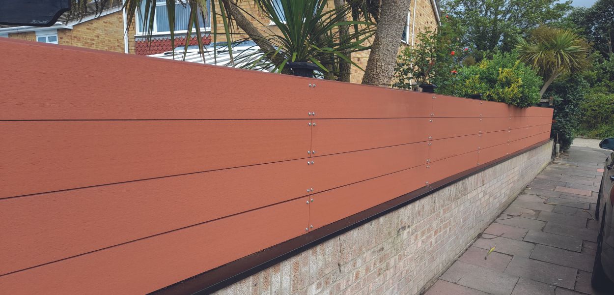 Cladco Composite Fencing Panels in Redwood