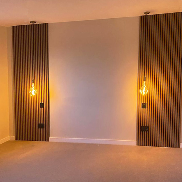 Cladco Internal Slatted Wall Panels in Golden Pine on each side of wall