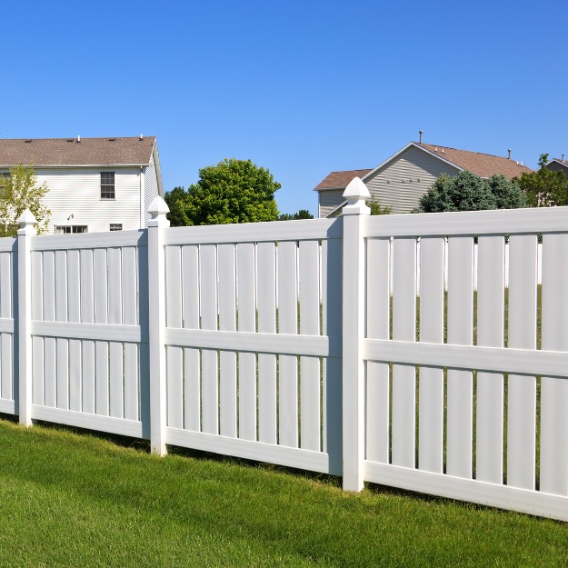 Recycled plastic fencing panels in a garden