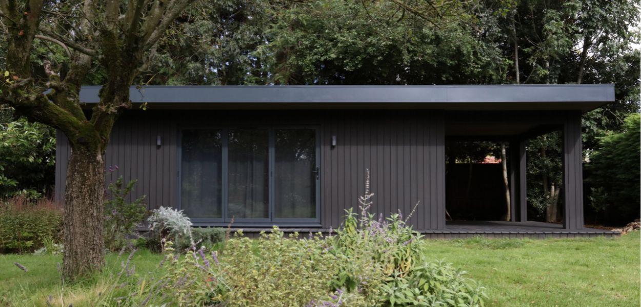 Modern garden room art studio with Cladco Composite Cladding in Charcoal