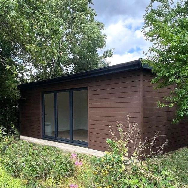Cladco Composite Cladding in Coffee on garden room