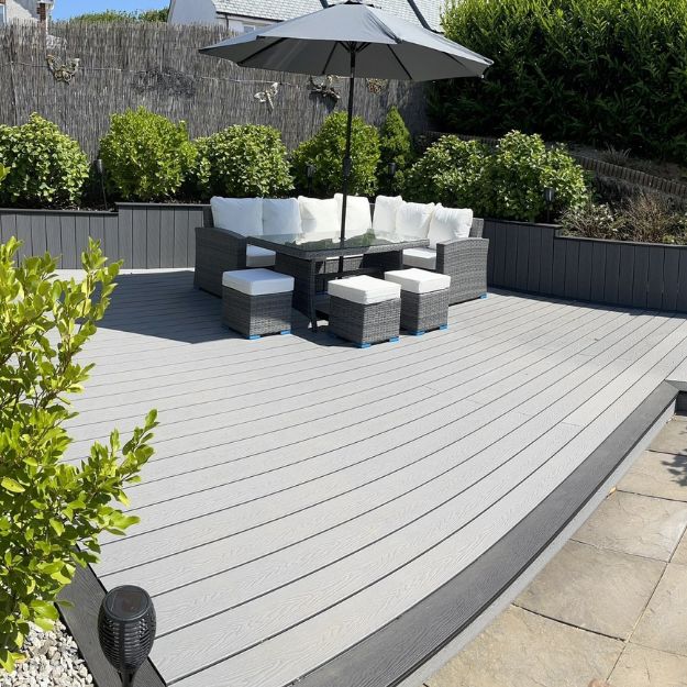 Grey composite decking boards in the sun