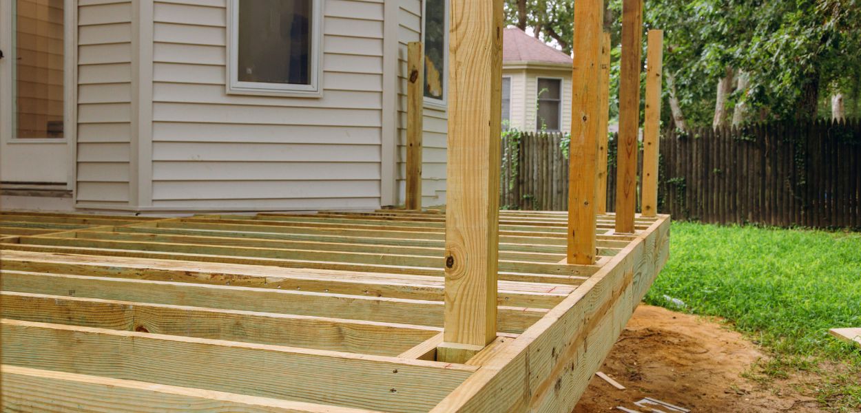 Timber joists for decking frames with posts as upright supports