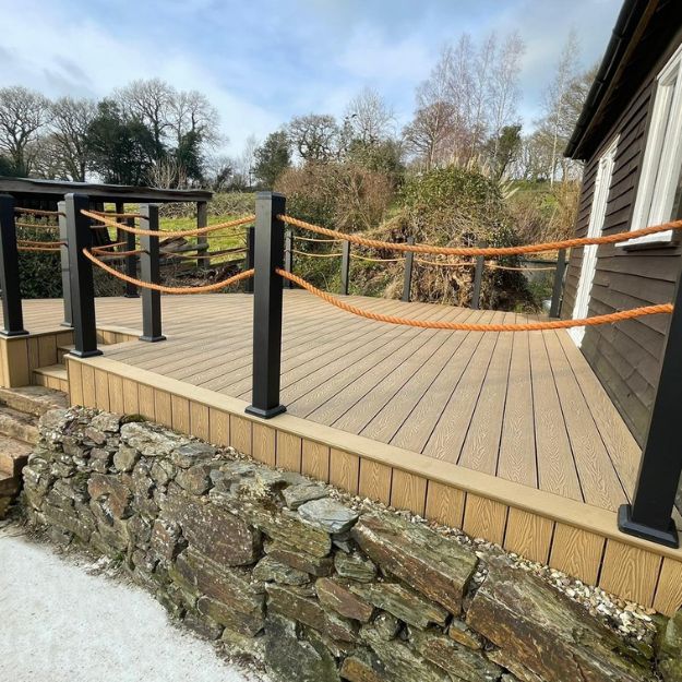 raised level decking above stone wall