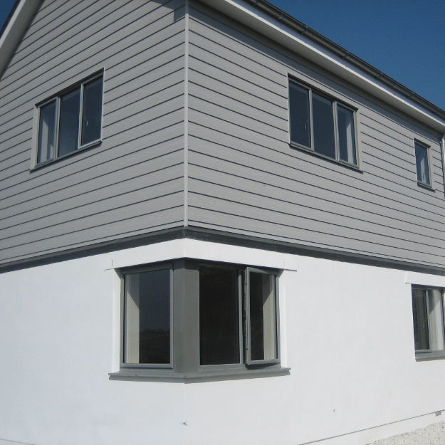 House with exterior wall cladding