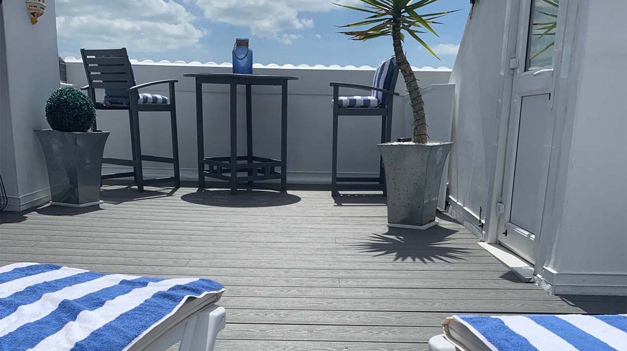 Narrow rooftop deck with Stone Grey Woodgrain Decking