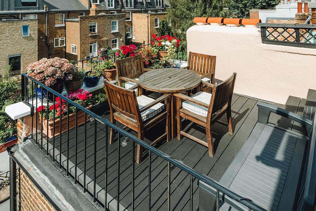 Small rooftop garden with dark decking