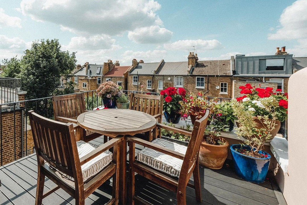 Small rooftop garden with dark decking