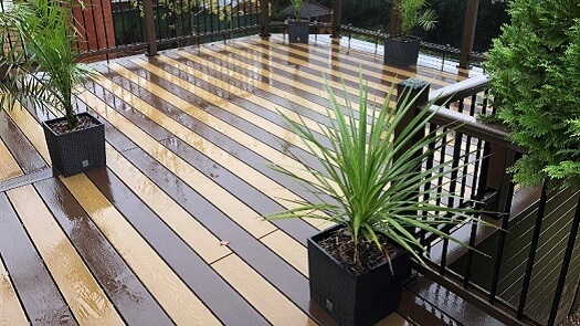 Raised garden deck with potted plants